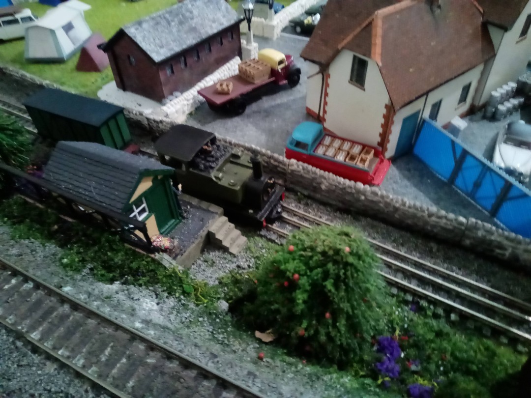 Larnswick UK on Train Siding: The pub is stocking up, people are camping, flowers in bloom, all is well at Larnswick #modelrailway #scenery