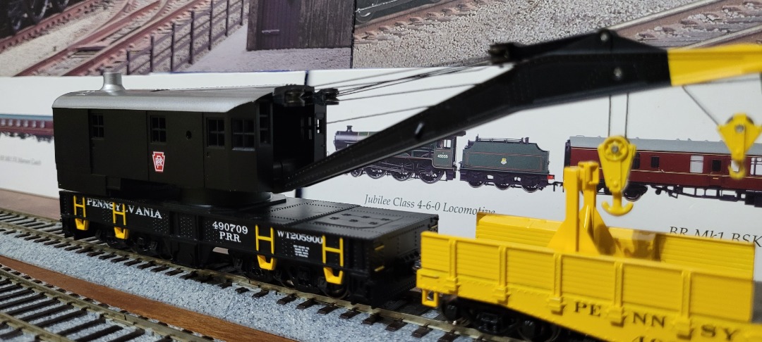 M. on Train Siding: Added this 200-ton crane and boom car to my collection yesterday. Plans to detail the boom car are in the works, so it's going to look
a lot...
