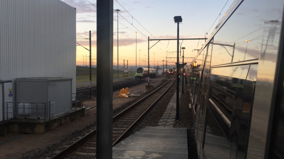 jadewilson on Train Siding: Early morning depot view while on the Hot Standby Train. The AVI is to the left. Trains go through the AVI which check pantograph
pressure...