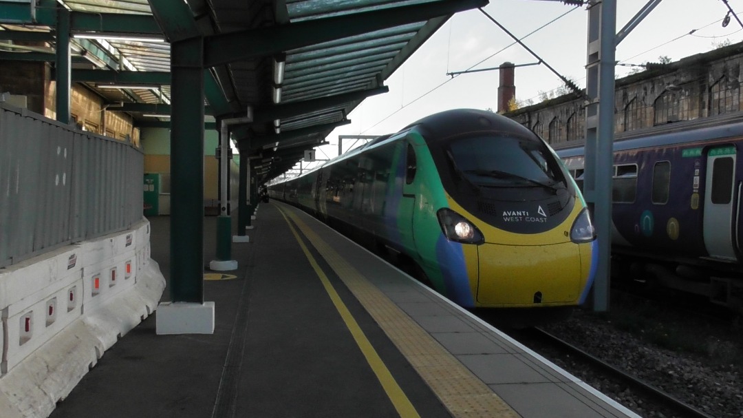 N Hirst Photography on Train Siding: Avanti West Coast 390 121 seen in the climate variant of the Avanti livery arriving into platform 1 at Carlisle on a
northbound...