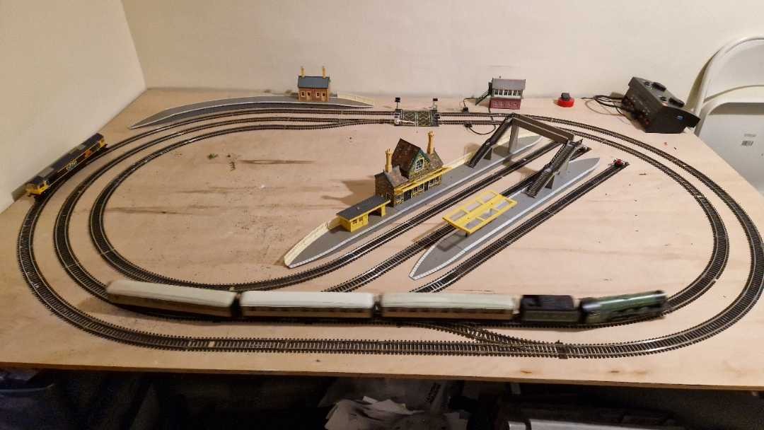 Meridian Model Railway on Train Siding: It's been a while, but I've moved the layout into a different room and been playing with the track plan. This
is what I've come...
