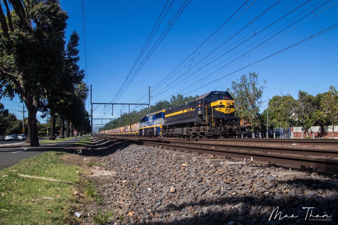Max Thum on Train Siding: X31, slows to a crawl on approach to Glenhuntly Tram Square, as it leads VL351 towards North Dynon after dropping off its coils and
various...