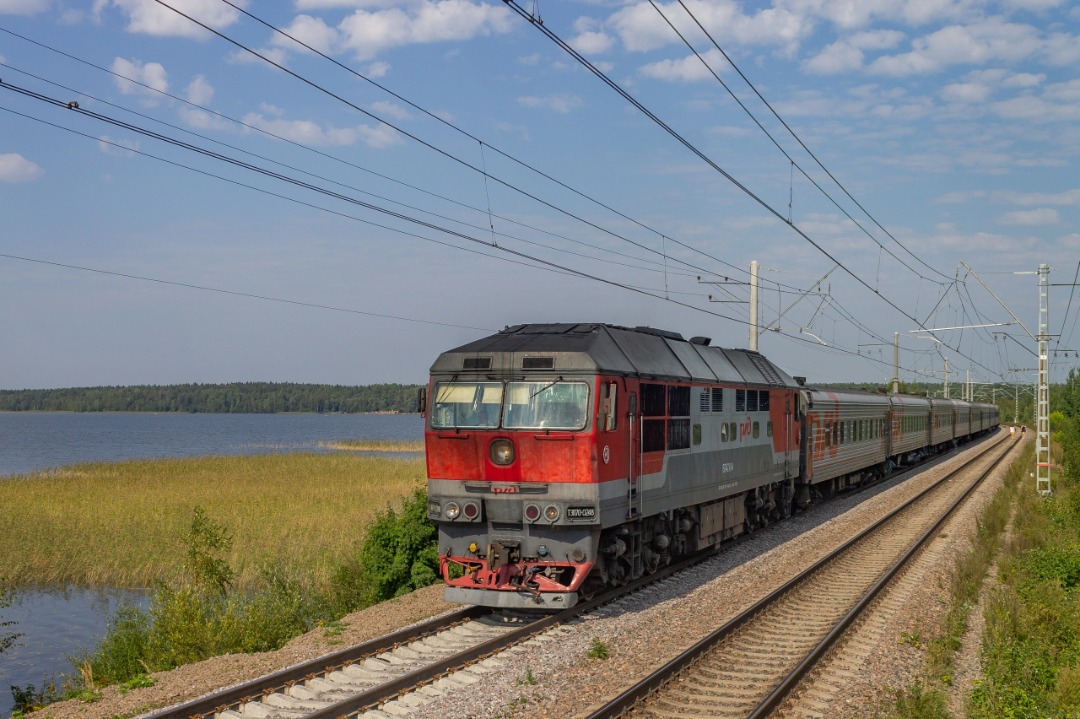 Vladislav on Train Siding: diesel locomotive TEP70-0248 with passenger train Kostomuksha - St. Petersburg on the stage Peri - Toksovo. 2022