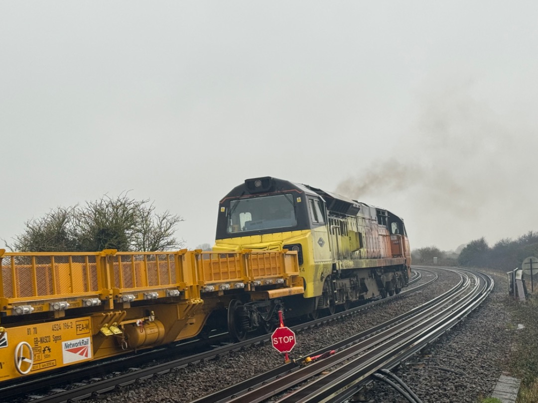 Mista Matthews on Train Siding: Colas Rail 70814 departs possession at Arundel Junction with 6Y85 on route to Eastleigh.