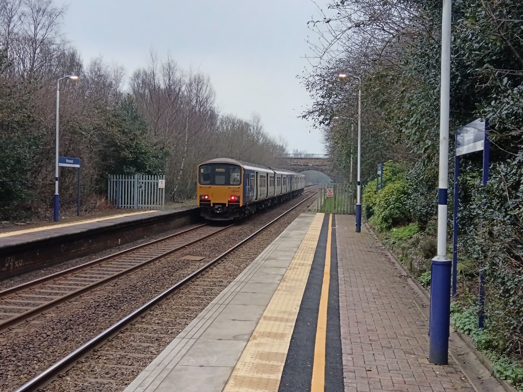 Whistlestopper on Train Siding: Northern class 150s No. #150224 and #150124 passing Huncoat this morning working 2K64 0820 Blackburn to Headbolt Lane.