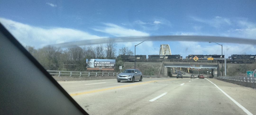 Pittsburgh amateur rail and history on Train Siding: Norfolk Southern Penn Central heritage unit cross over PA Route 51 following along the Ohio River
