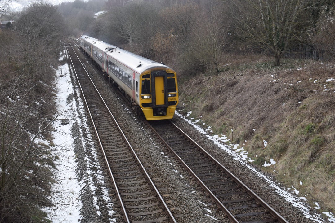 Hardley Distant on Train Siding: CURRENT: 158828 (Leading - 1st Photo) and 158825 (Behind - 2nd Photo) pass Rhosymedre near Ruabon today with the 1D11 13:41...