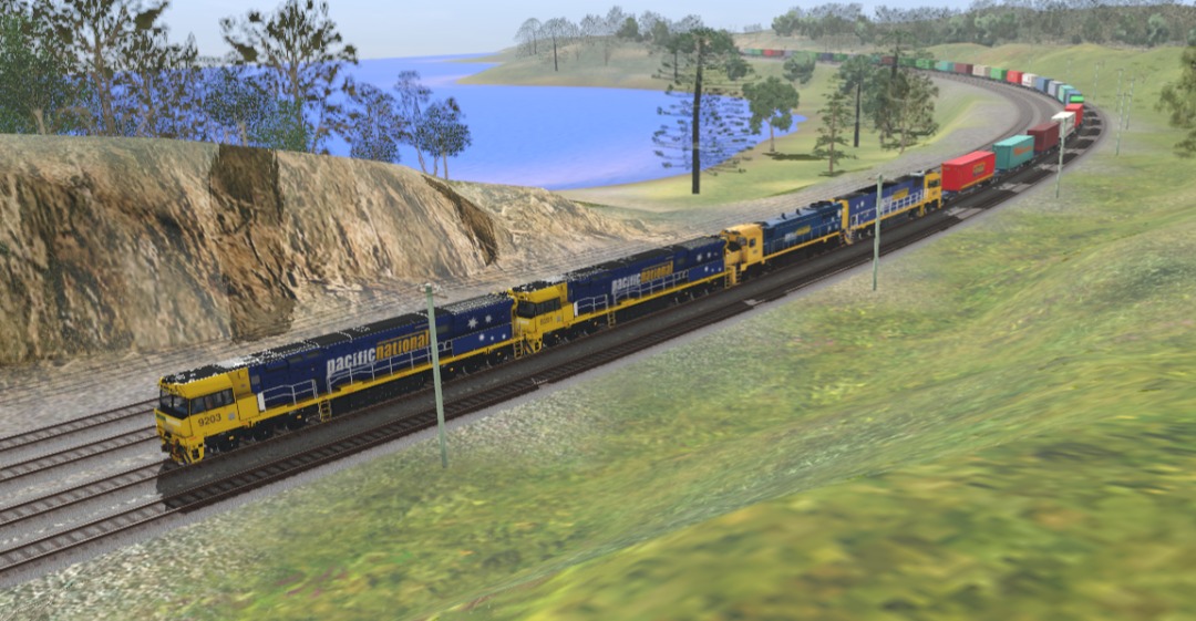 Rohan Train Vlogs on Train Siding: Quick screenshot from Trainz, this shows two 92 classes, a X class and a NR class on a Intermodal. The computer I used to
take this...