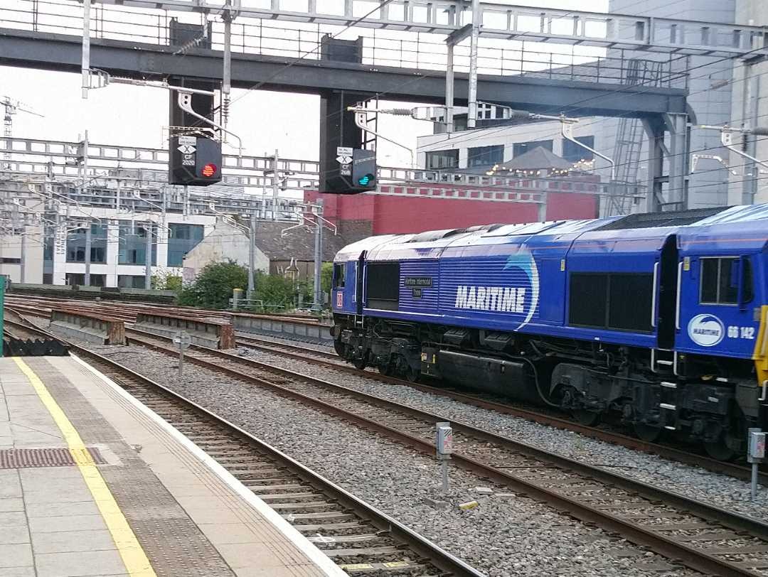Rail Express by Brad on Train Siding: Well I guess I should pop a photo or two up on here! 66142 and 66125 head past Caerdydd Canalog, yesterday 22nd August.
They...