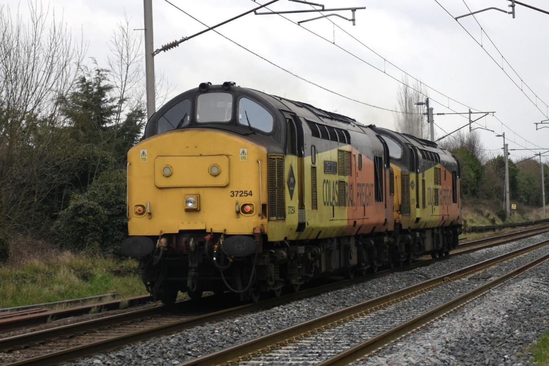 Inter City Railway Society on Train Siding: 37 245 Cardiff Canton with 37 175 (0Z10 DERBY R.T.C.(NETWORK RAIL) - MILLERHILL) seen at Bolton-le-Sands (12.34)