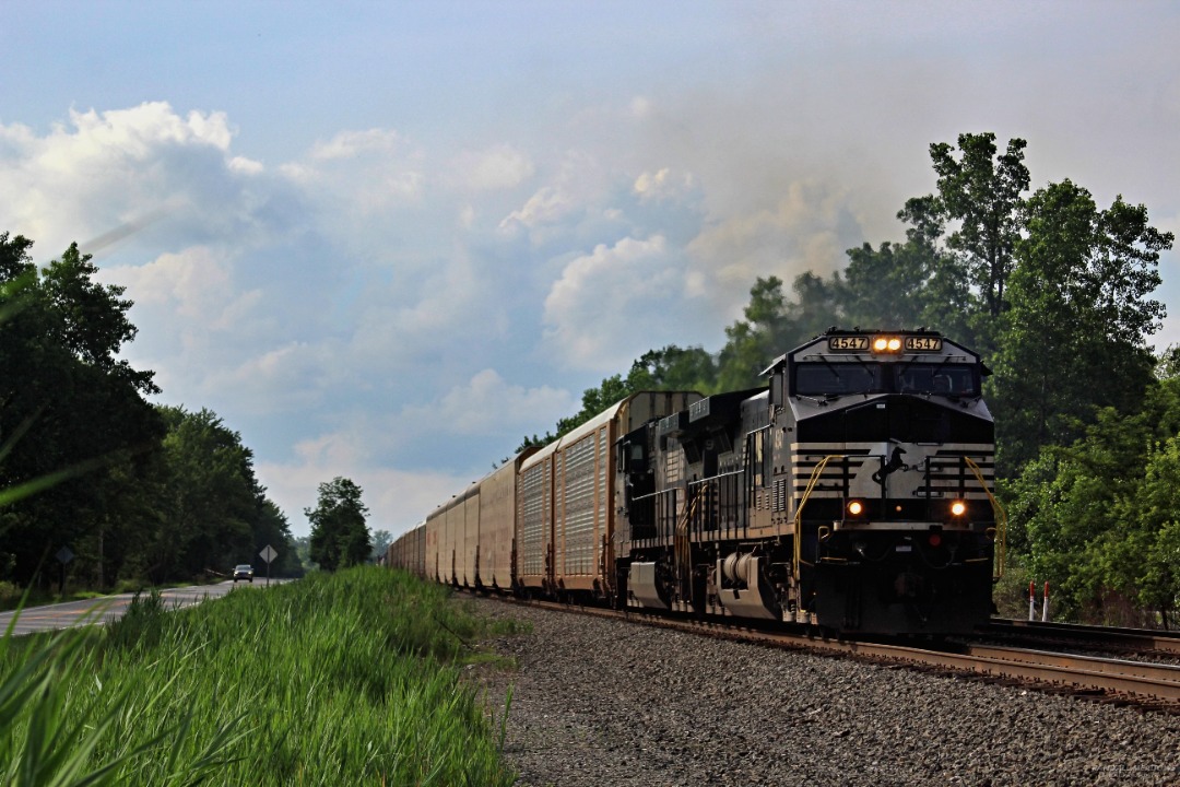 Randall Meadows on Train Siding: NS 4547 puts the horse in horsepower as it leads a Mixed freight train through Alliance Ohio.