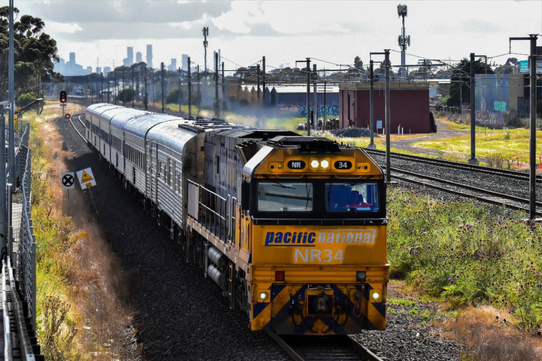 Shawn Stutsel on Train Siding: Pacific National's NR34 (PN Indigenous Livery) races through Williams Landing, Melbourne with 6MA8, Overland Service heading
for...