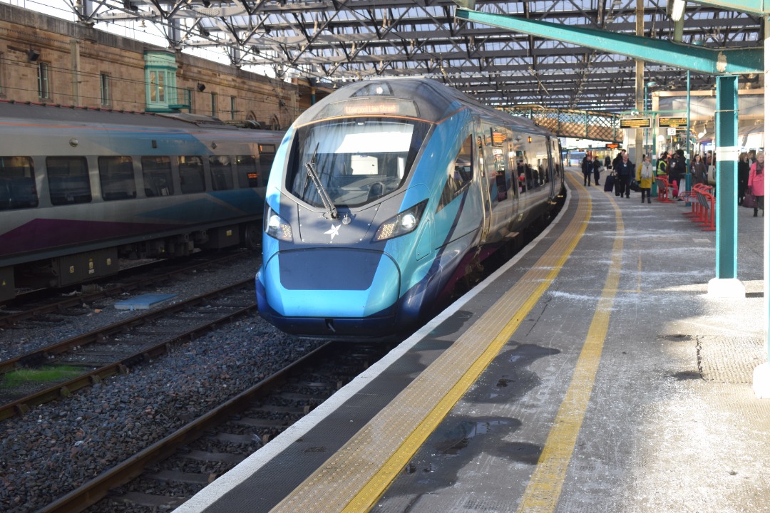 Hardley Distant on Train Siding: CURRENT: 397005 pauses at Carlisle Station yesterday with the 1M75 12:04 Glasgow Central to Liverpool Lime Street
(Transpennine...