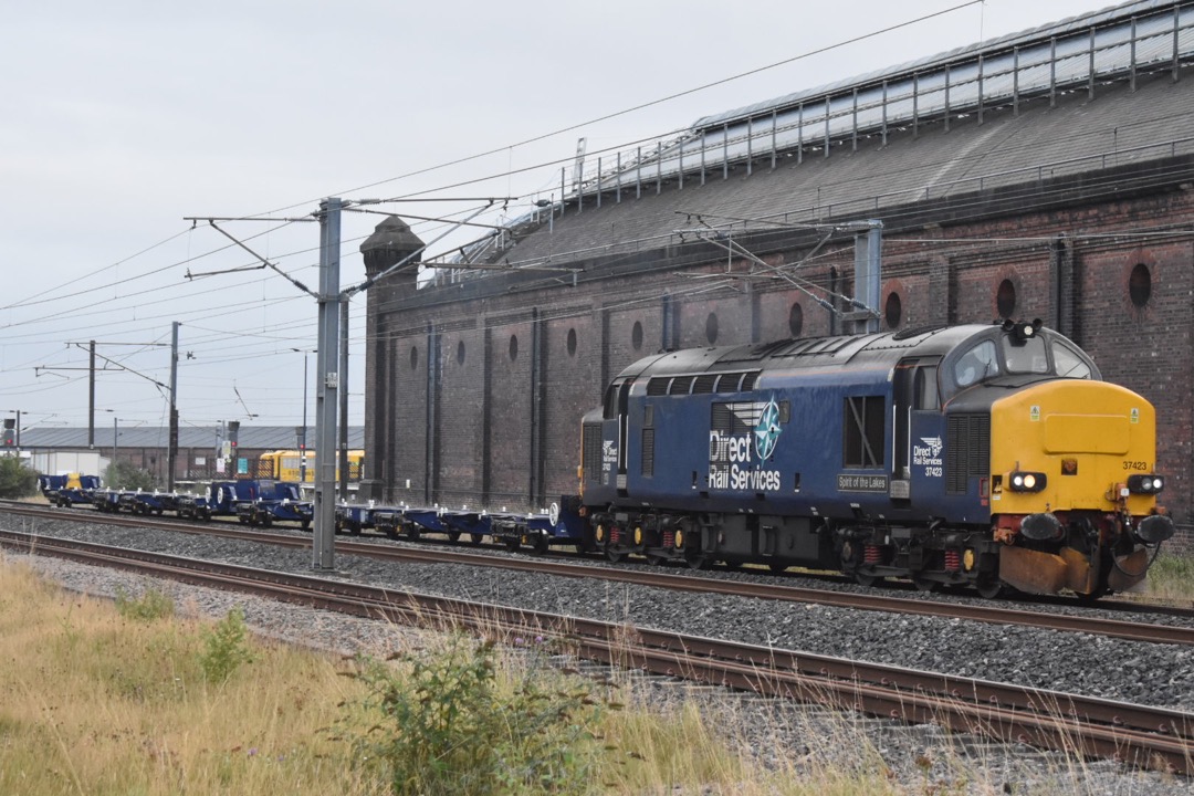 George Stephens on Train Siding: DRS 37423 seen passing Darlington working 4Z67 Doncaster West Yard - Motherwell TMD (DRS)