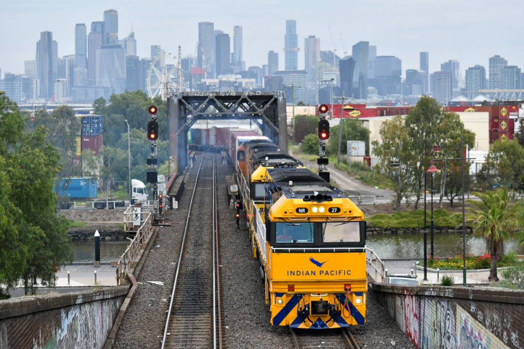 Shawn Stutsel on Train Siding: Pacific National's NR27 (IP MK V), NR53, and NR31 (GS) rumbles towards the Bunbury Street Tunnel, Footscray Melbourne with
4MA5,...