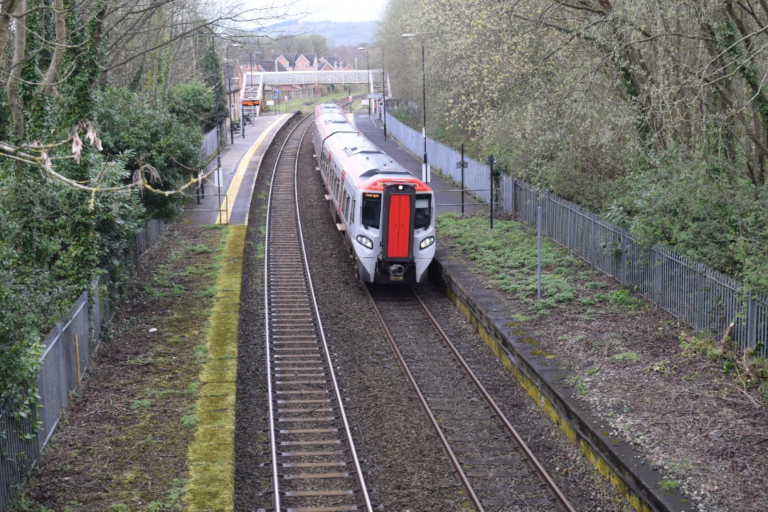 Hardley Distant on Train Siding: CURRENT: 197106 departs from Ruabon Station today with the 1W91 Cardiff Central to Holyhead (Transport for Wales) service.