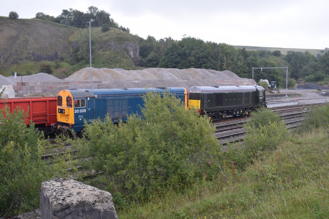 Hardley Distant on Train Siding: CURRENT: 20007 (Front) and 20205 (Rear) are seen stabled at Dove Holes Quarry at Peak Forest on Saturday (26th August) between
duties.