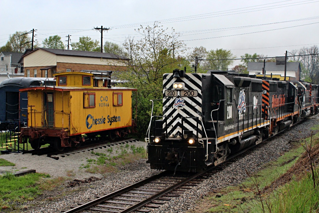 Randall Meadows on Train Siding: Wheeling & Lake Erie 200 (Ohio bicentennial unit) leads a mixed freight train through Hartville Ohio