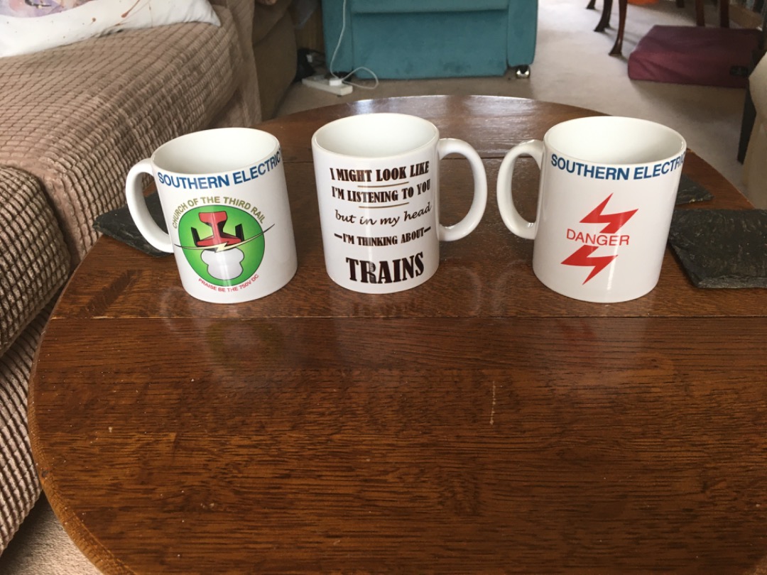chris.j.bird on Train Siding: The interior of my 172 yesterday. My collection of railway mugs and a couple of TFW 2 car sets seen at Chester.