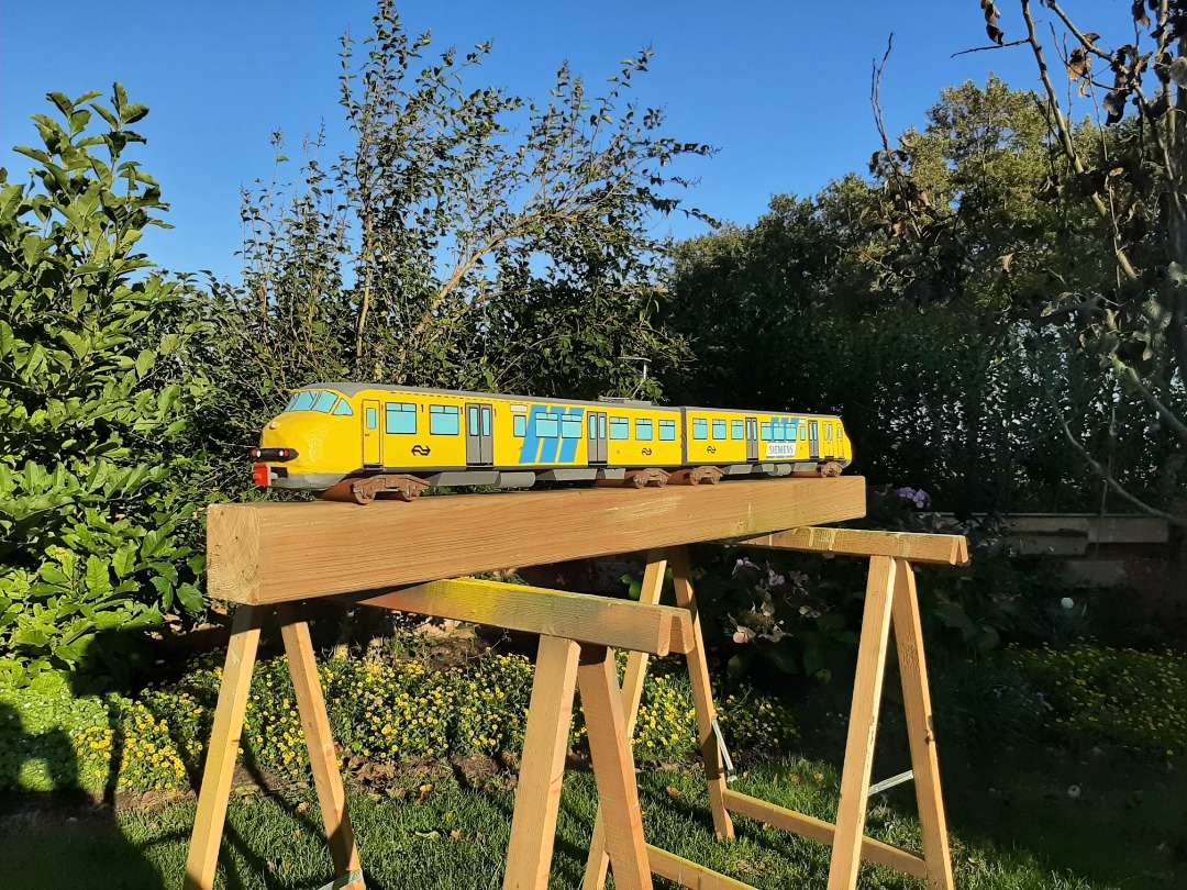 RRail on Train Siding: And another train made out of scrapwood. It measures 125 centimeters. Again the wheels are made of broom stick the train itself is made
out of...