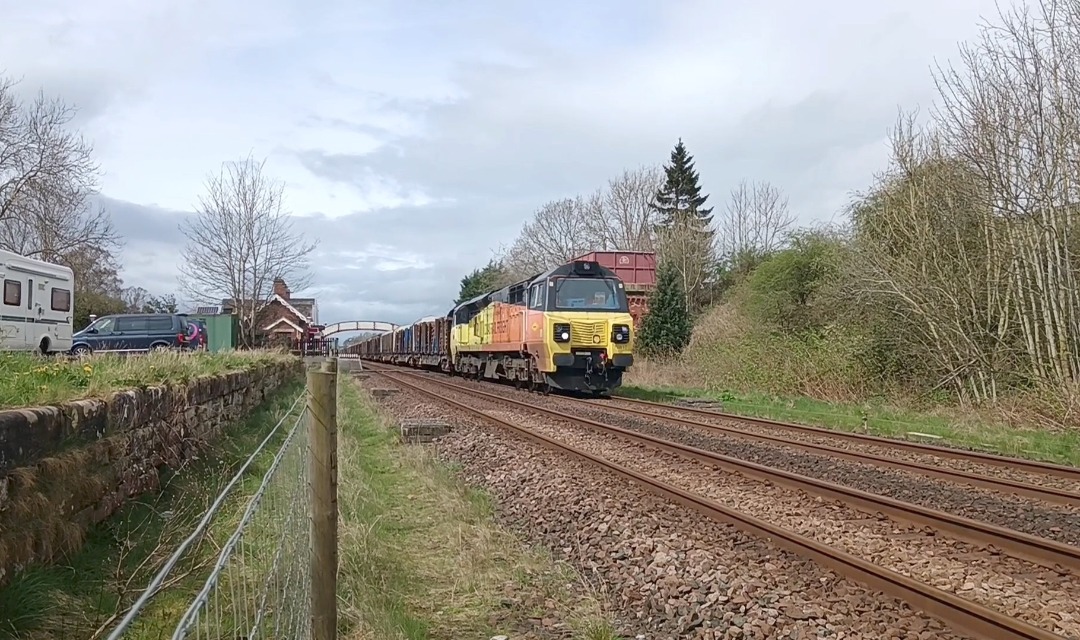 Whistlestopper on Train Siding: Colas Rail class 70/8 No. #70810 passing Appleby this afternoon working 6J37 1252 Carlisle Yard to Chirk Kronospan with the
logs!