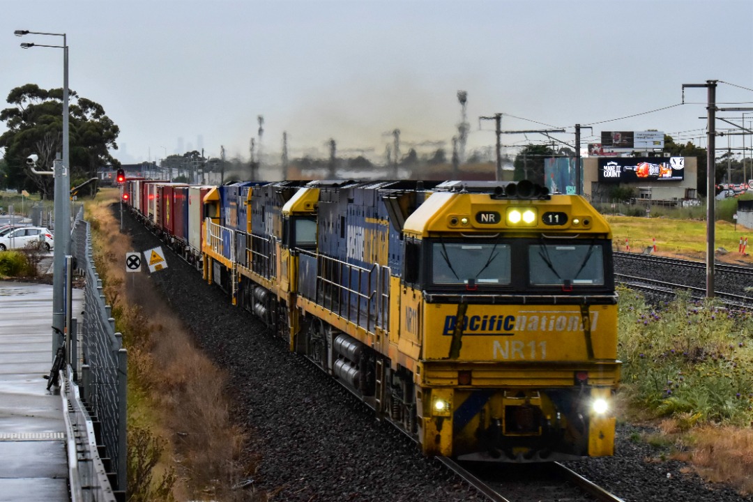 Shawn Stutsel on Train Siding: Pacific National's NR11, NR92 and NR112 races through a wet and drizzly Williams Landing, Melbourne with 1MP2, Steel Service
heading for...