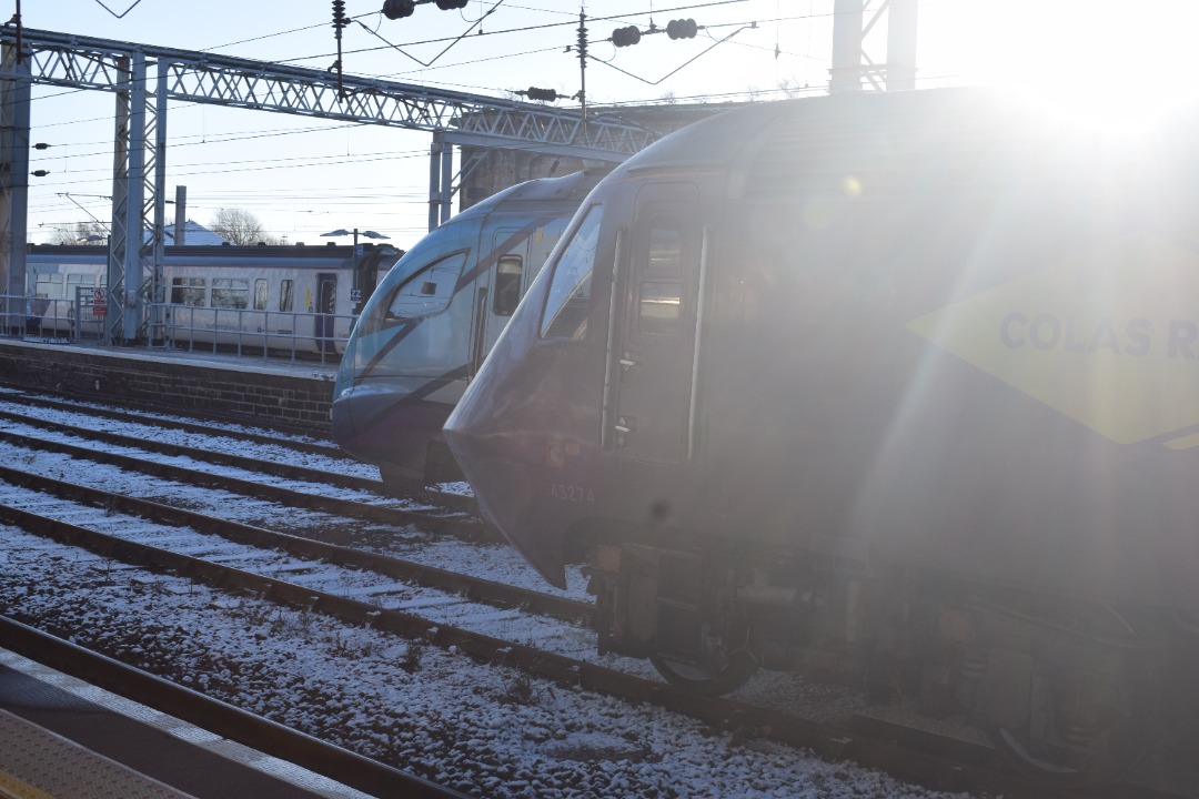 Hardley Distant on Train Siding: CURRENT: 43274 (Nearest Camera) and 397002 (Behind) are seen stabled in the sunshine on the two centre through roads at
Carlisle...