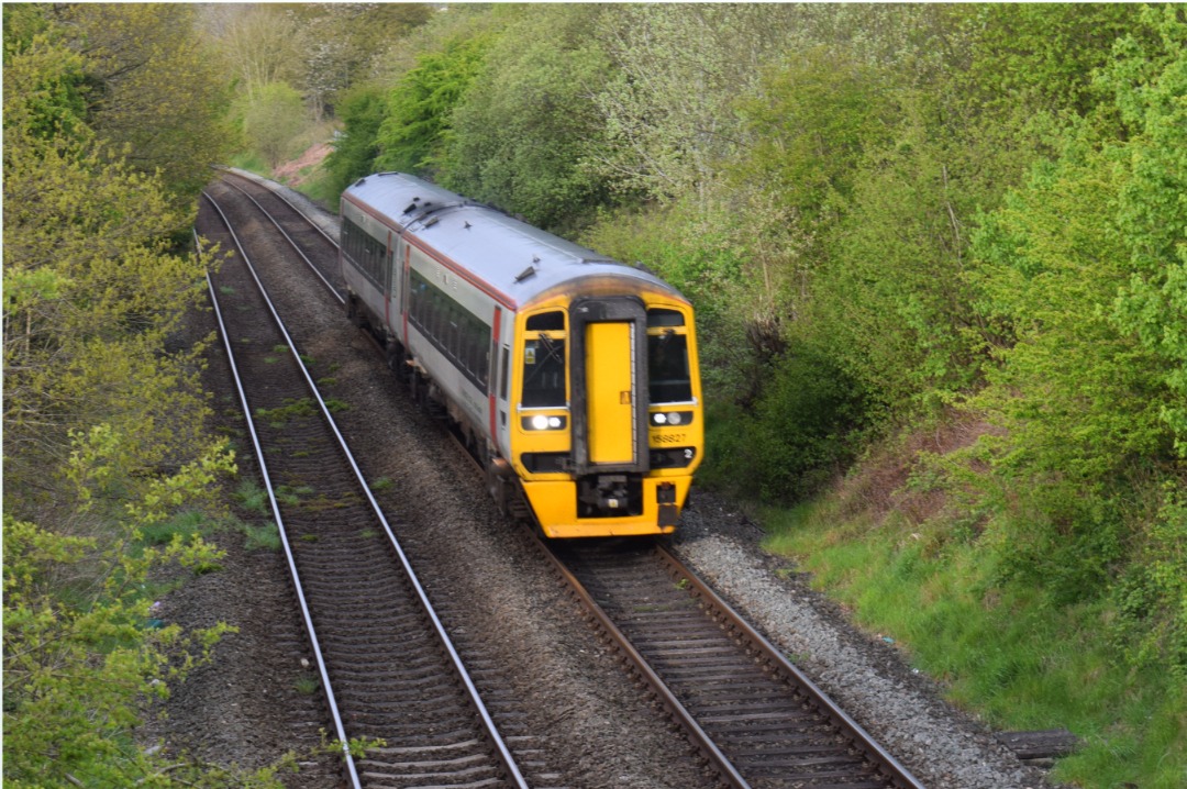 Hardley Distant on Train Siding: CURRENT: 158827 passes Rhosymedre near Ruabon today with the 2D93 07:00 Shrewsbury to Wrexham General (Transport for Wales)
service.