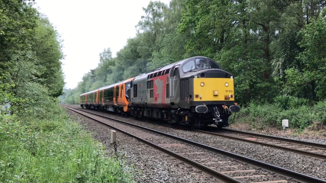 Fastline Films on Train Siding: 37510 'Orion' at Sutton Park dragging 730037 working 5Q65 Derby Litchurch Lane - Oxley Car. M.D. on 1st June 2023
