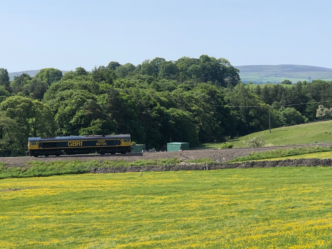 k unsworth on Train Siding: GBRf 66705 "Golden Jubilee" Wends its way - light engine along the former Skipton - Grassington branch towards the Tarmac
Swindon quarry...