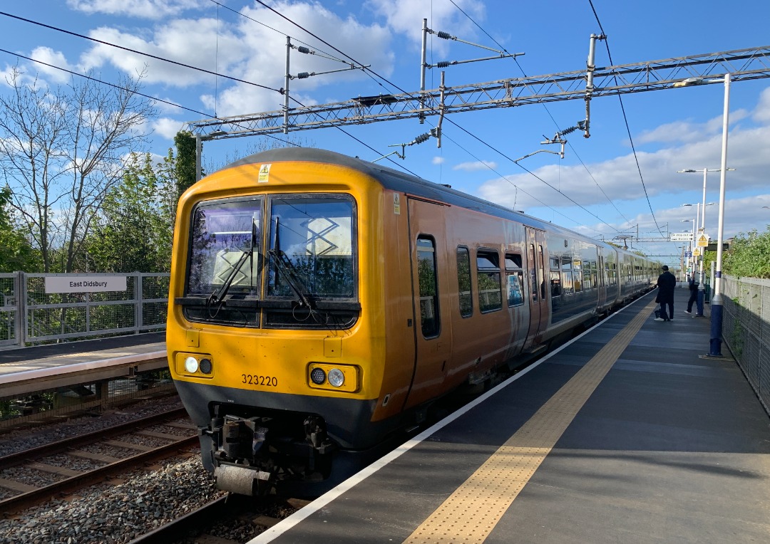 Chris Pindar on Train Siding: Still in West Midlands colours, 323220 arrives at East Didsbury. Also 197105 at the same place.