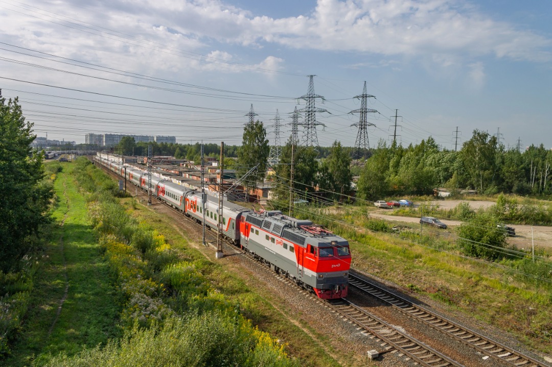 Vladislav on Train Siding: electric locomotive CHS2T-1036 with a passenger train on the Dolgorukov's Dacha - Zanevsky post II stage. 2022