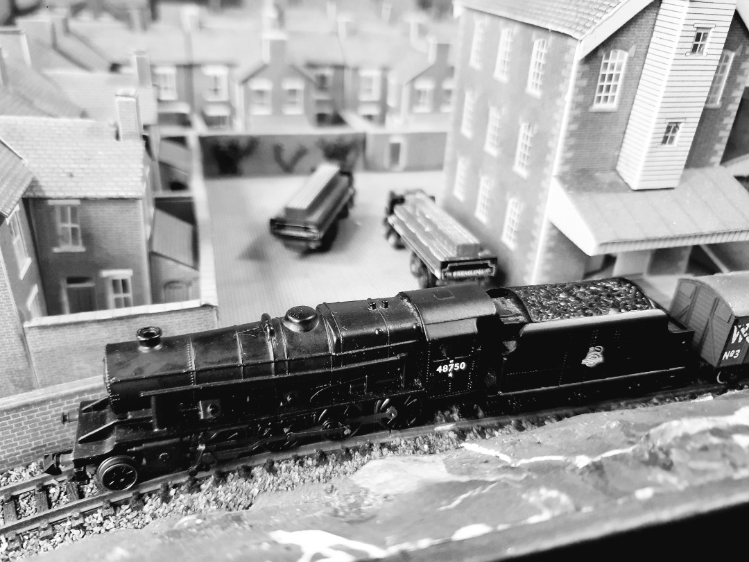 Locomotive Lloyd on Train Siding: The new British Railways 8F awaits in the brewery siding, preparing to haul the rake of beer vans away.....better be quiet,
pub shuts...