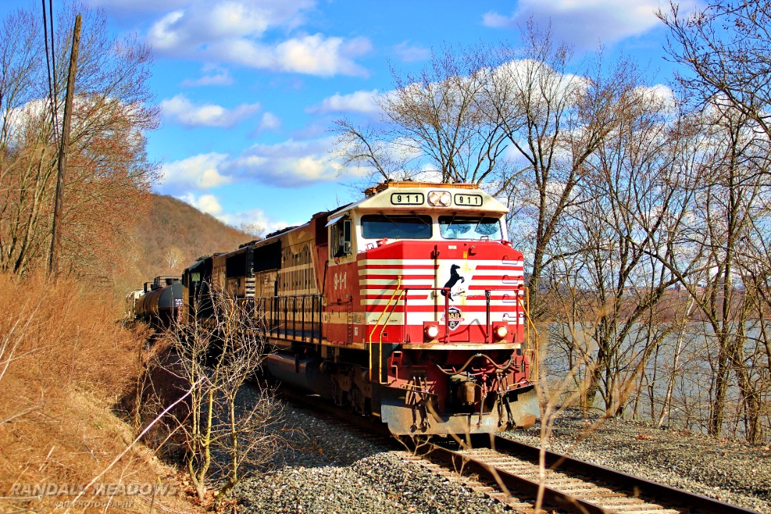 Randall Meadows on Train Siding: NS 9-1-1 (Honoring First Responders unit) lead NS C65 through the mountains of Pennsylvania and along the Ohio river