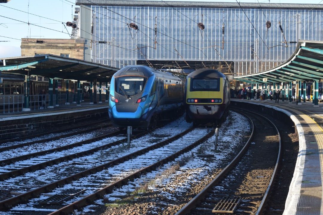 Hardley Distant on Train Siding: CURRENT: 397002 (Left) and 43274 (Right) are pictured together at Carlisle Station yesterday.