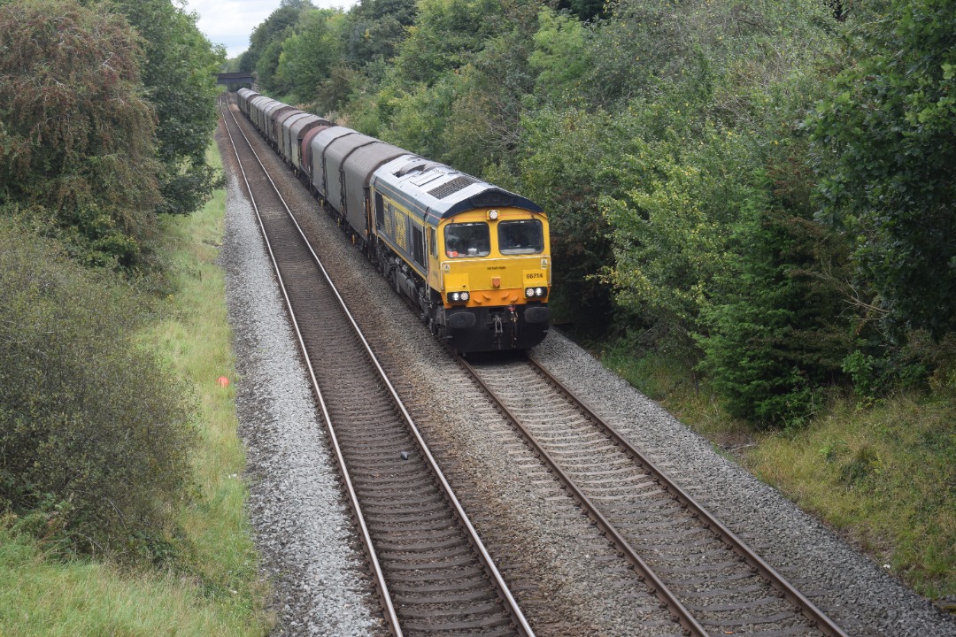 Hardley Distant on Train Siding: CURRENT: 66714 'Cromer Lifeboat' passes Rhosymedre near Ruabon today with the 6V75 11:16 Dee Marsh Reception to
Margam Terminal...