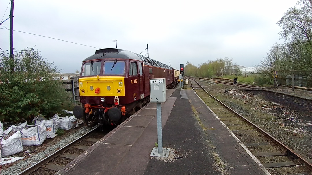 Ben Lock on Train Siding: 1Z47 1224 Manchester Victoria to Skipton 57313 Scarborough castle - 47812 ( Northern belle ) at Rochdale 21.04.23