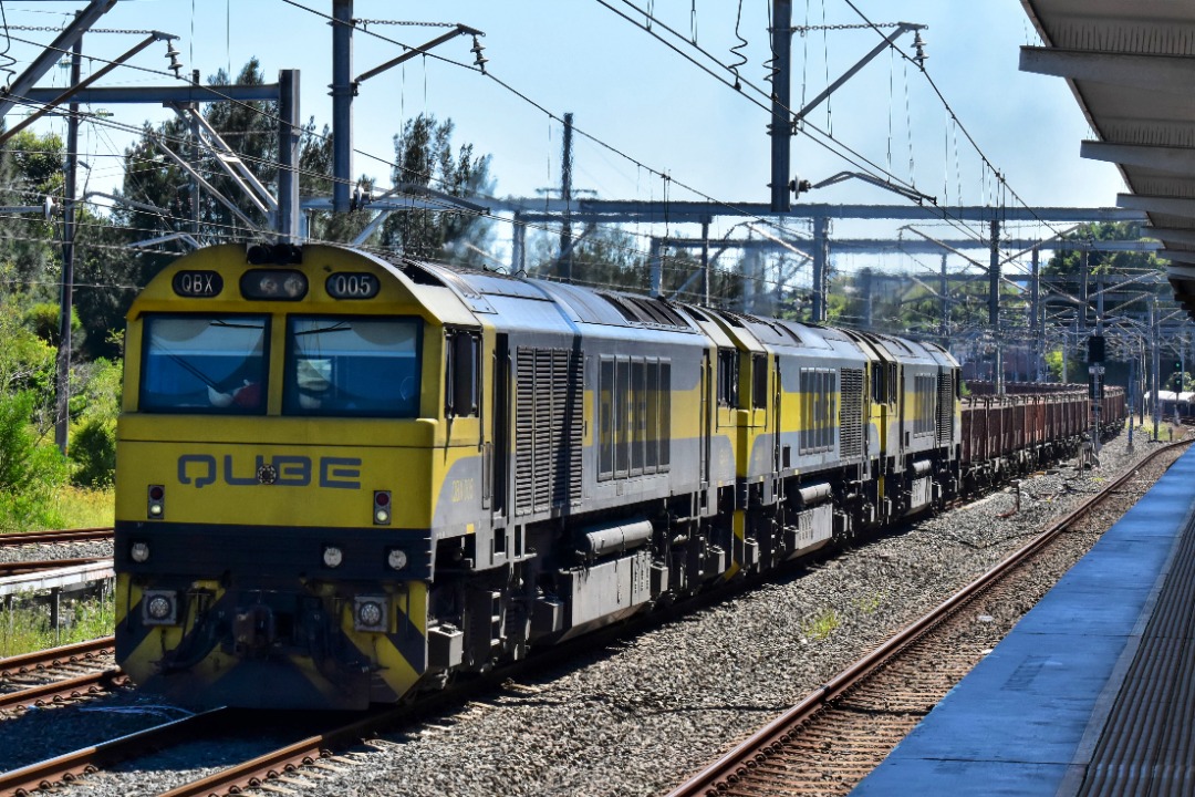 Shawn Stutsel on Train Siding: Qube's QBX005, QBX001 and QBX??? trundles past Wolli Creek Station, Sydney with 8964, Iron ore service bound for Port
Kembla...