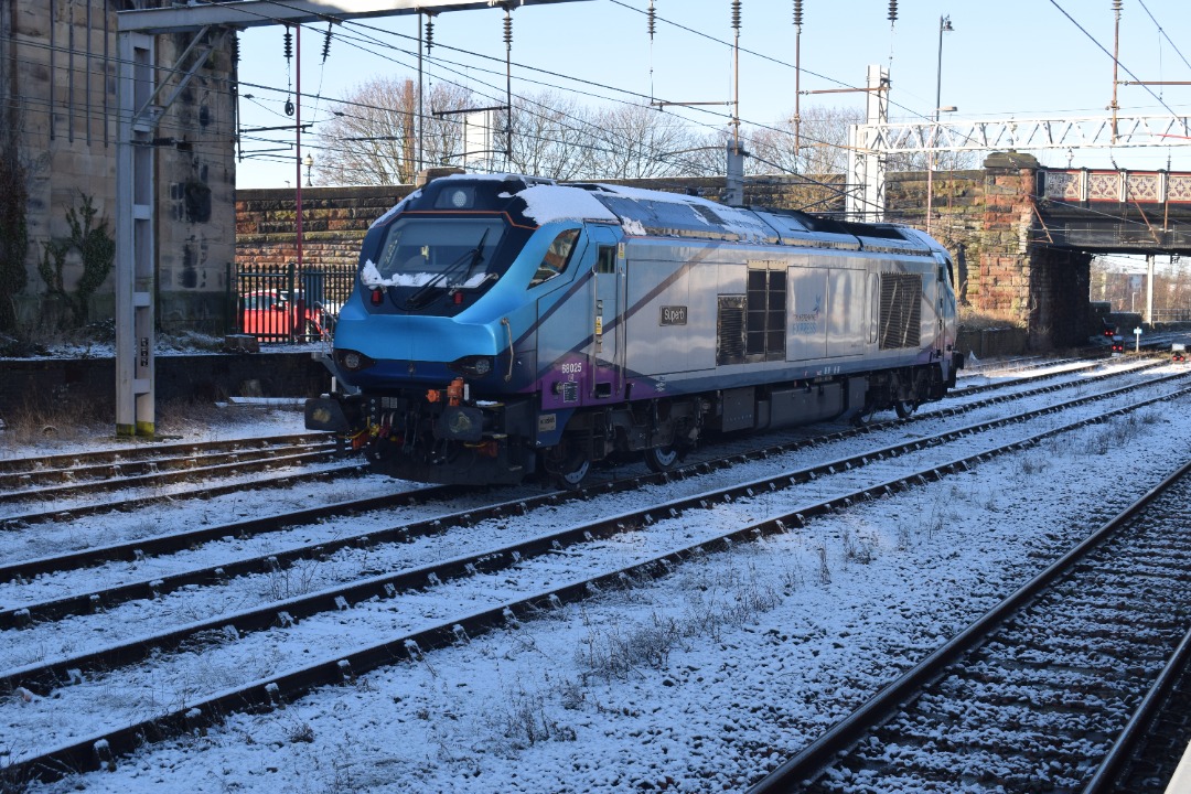 Hardley Distant on Train Siding: CURRENT: 68025 'Superb' is seen stabled in the Sidings on the West side of Carlisle Station yesterday between duties
with Transpennine...