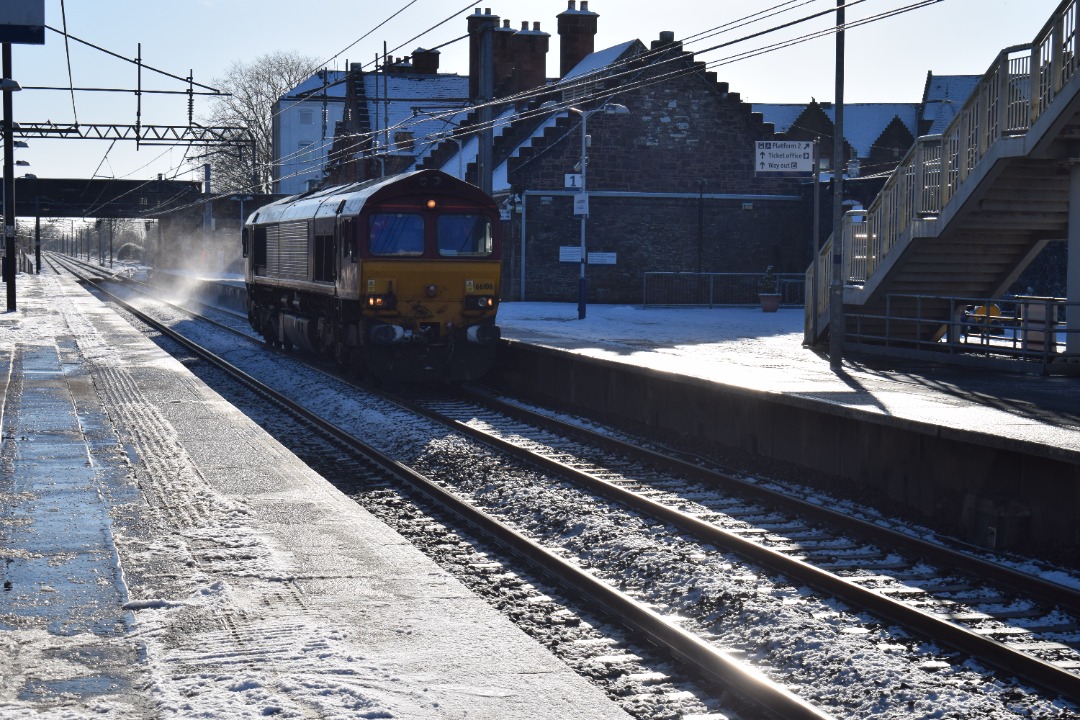 Hardley Distant on Train Siding: CURRENT: 66106 speeds through Lockerbie Station yesterday with the 6S50 12:19 Carlisle New Yard to Millerhill Shunt and
Marshalling...