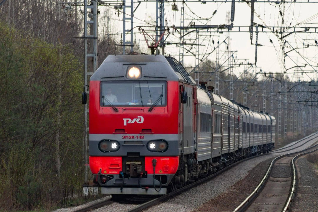 Vladislav on Train Siding: electric locomotive EP2K-148 with a passenger train on the Manushkino - Zanevsky Post II stage. 2023