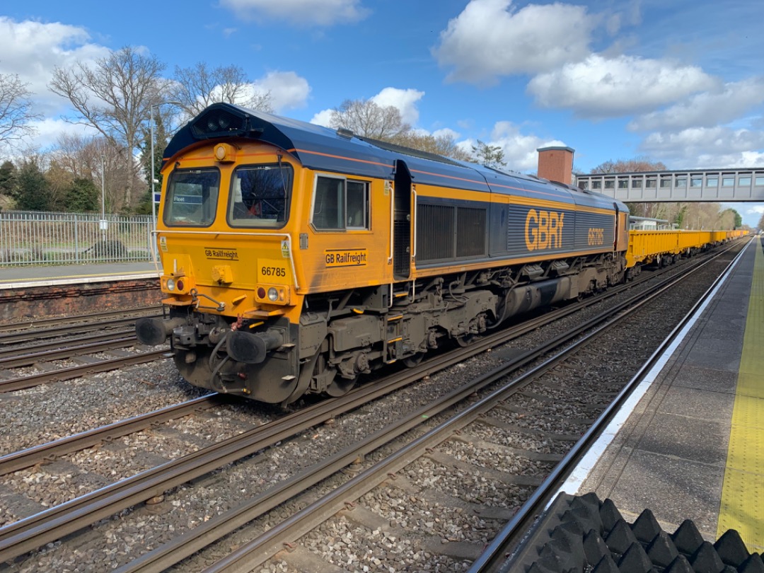 Mista Matthews on Train Siding: GBRf Class 66 66785 departs possession at Fleet station with head code 6G11 on route to Eastleigh