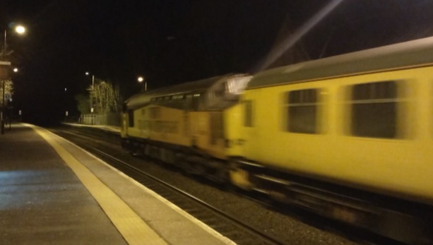 Hardley Distant on Train Siding: CURRENT 37610 (Leading - 1st Photo) and 37421 (Rear - 2nd Photo) pass Ruabon Station today on the 1Q55 11:10 Derby R.T.C to
Derby...